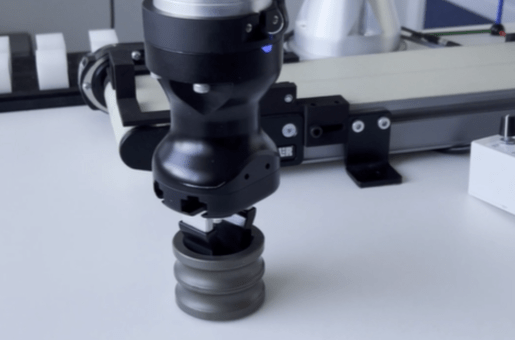UR cobot picking and placing finished part